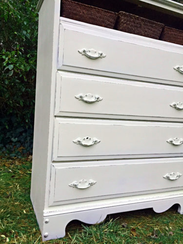 Dresser top drawer replaced with baskets & painted in General Finishes Antique White Milk Paint Distressed and sealed with Polyvine Satin Wax like Varnish